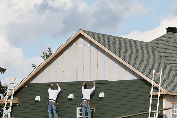 Professional Siding technician working in Swanton, OH